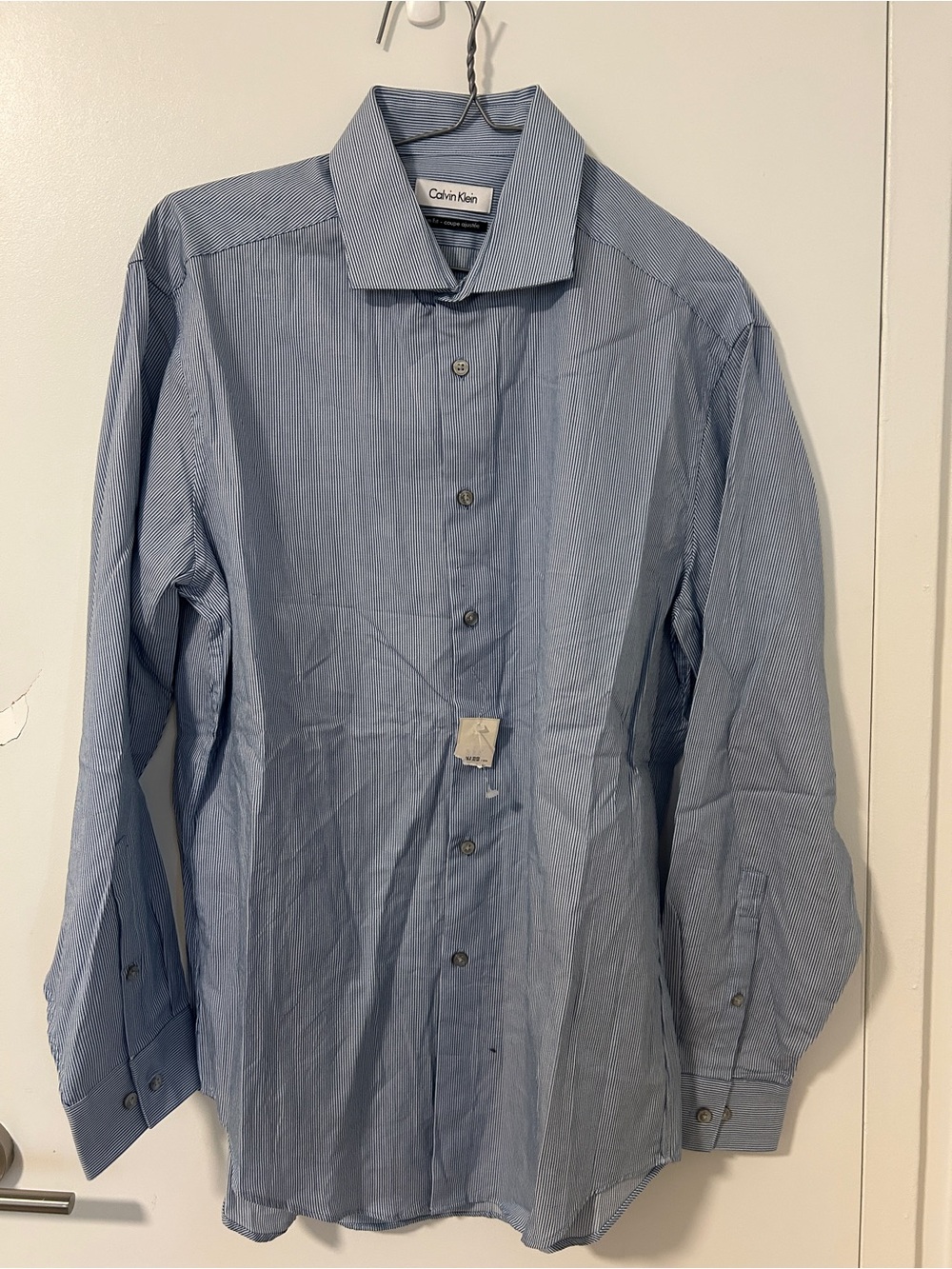 2 shirts :Calvin Klein Light Blue Pinstripe Button-Down Shirt